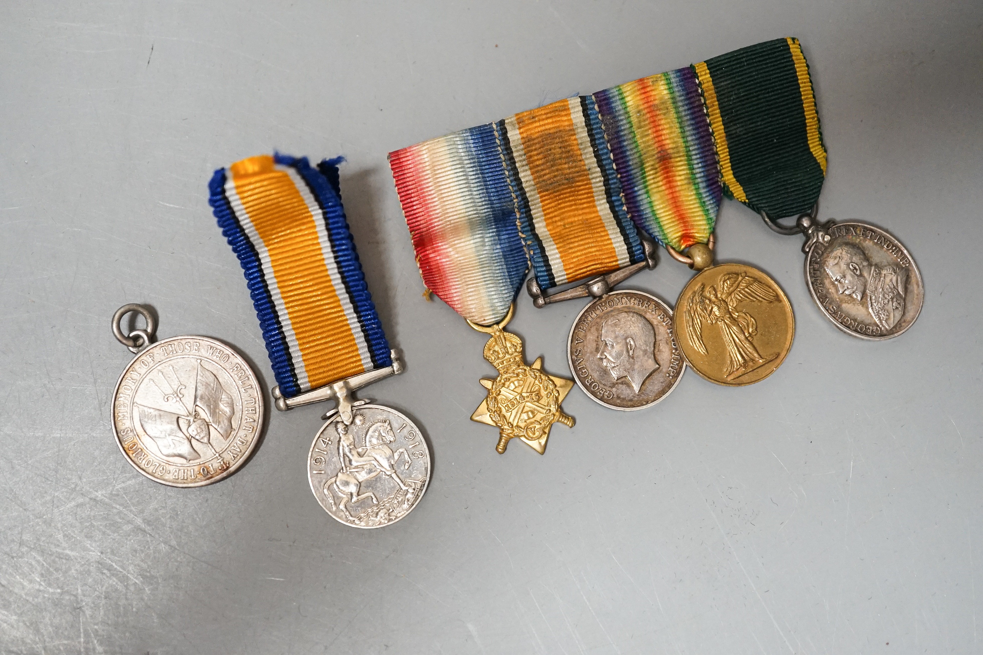 A group of George V and George VI miniature medals, and a miniature Crimea medal